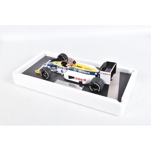 41 - A BOXED MINICHAMPS WILLIAMS HONDA FW11 N. PIQUET . GERMAN GP 1986 SCALE 1:18 MODEL VEHICLE, numbered... 