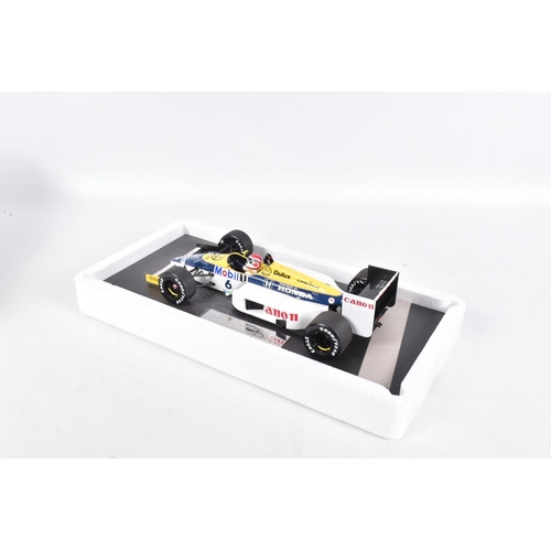 41 - A BOXED MINICHAMPS WILLIAMS HONDA FW11 N. PIQUET . GERMAN GP 1986 SCALE 1:18 MODEL VEHICLE, numbered... 