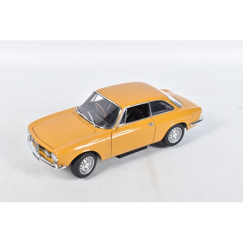 44 - A BOXED AUTOART ALFA ROMEO 1750 GTV SCALE 1:18 MODEL VEHICLE, numbered 70108, painted mustard yellow... 