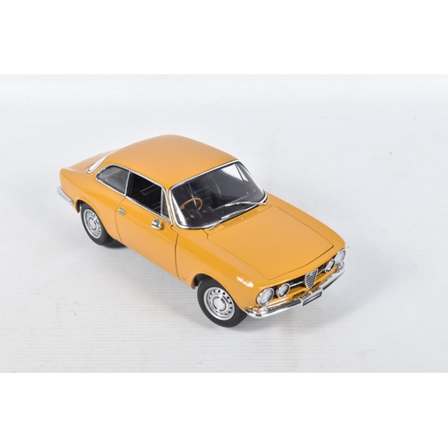 44 - A BOXED AUTOART ALFA ROMEO 1750 GTV SCALE 1:18 MODEL VEHICLE, numbered 70108, painted mustard yellow... 