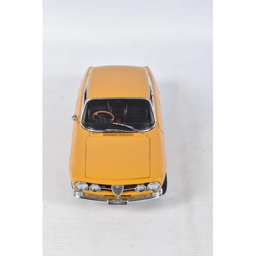 44 - A BOXED AUTOART ALFA ROMEO 1750 GTV SCALE 1:18 MODEL VEHICLE, numbered 70108, painted mustard yellow... 