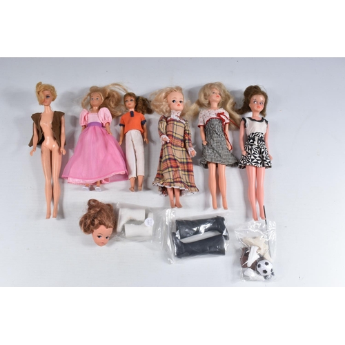 69 - A QUANTITY OF UNBOXED AND ASSORTED VINTAGE DOLLS, to include Barbie's friend Midge, head not marked ... 