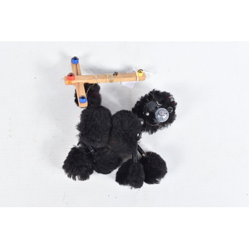 86 - FOUR BOXED PELHAM DOG PUPPETS, Bengo, Tuff, Wags and a black Poodle, all appear complete and in fair... 