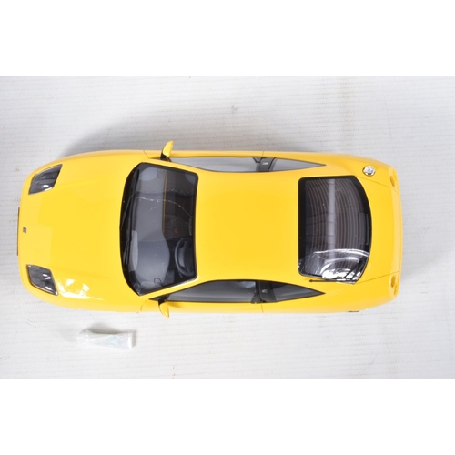 117 - A BOXED OTTO MOBILE FIAT COUPE TURBO 20V JAUNE 1:18 MODEL VEHICLE, numbered OT644UVI, yellow body, w... 