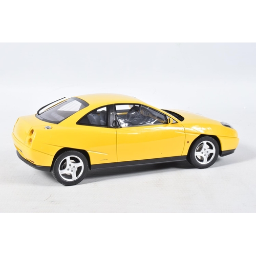 117 - A BOXED OTTO MOBILE FIAT COUPE TURBO 20V JAUNE 1:18 MODEL VEHICLE, numbered OT644UVI, yellow body, w... 