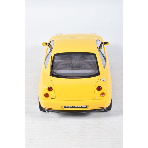 117 - A BOXED OTTO MOBILE FIAT COUPE TURBO 20V JAUNE 1:18 MODEL VEHICLE, numbered OT644UVI, yellow body, w... 