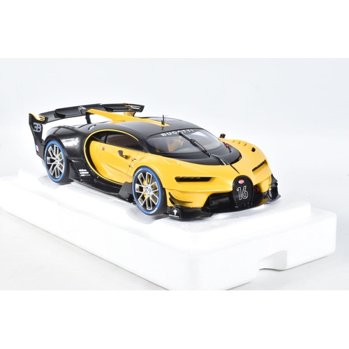 122 - A BOXED AUTOART BUGATTI VISION GRAN TURISMO 1:18 MODEL VEHICLE, numbered 70989, in Giallo Midas yell... 