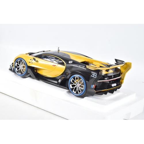 122 - A BOXED AUTOART BUGATTI VISION GRAN TURISMO 1:18 MODEL VEHICLE, numbered 70989, in Giallo Midas yell... 