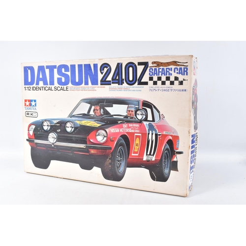 131 - A BOXED UNBUILT TAMIYA DATSUN 240 Z SAFARI CAR 1:12 SCALE MODEL VEHICLE, numbered BS1208 3500, model... 