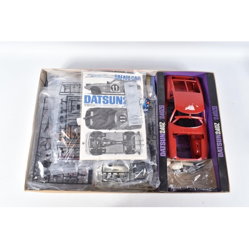 131 - A BOXED UNBUILT TAMIYA DATSUN 240 Z SAFARI CAR 1:12 SCALE MODEL VEHICLE, numbered BS1208 3500, model... 