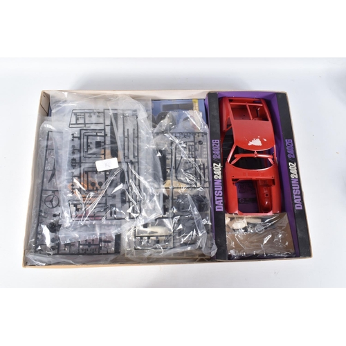 131 - A BOXED UNBUILT TAMIYA DATSUN 240 Z SAFARI CAR 1:12 SCALE MODEL VEHICLE, numbered BS1208 3500, model... 