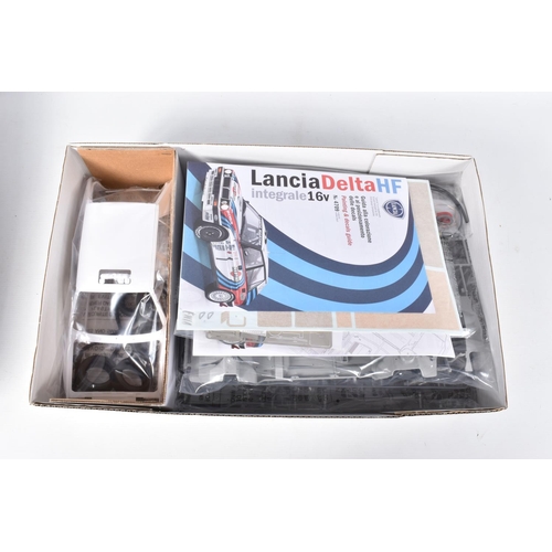 134 - A BOXED UNBUILT ITALERI LANCIA DELTA HF INTEGRALE 16V 1:12 SCALE MODEL RALLY CAR, numbered 4709, all... 