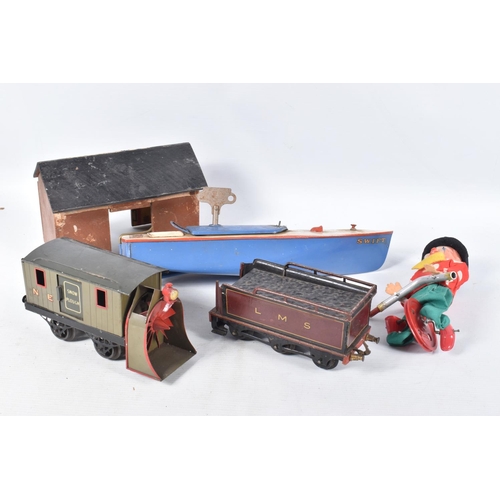 144 - AN UNBOXED HORNBY TINPLATE CLOCKWORK SPEEDBOAT 'Swift', blue deck and cover, white deck with trim, w... 