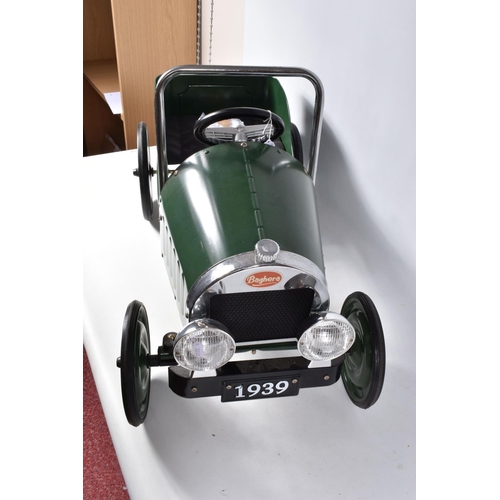 156 - A CHILDS BAGHERA PEDAL CAR, numbered 2195, in British racing green with solid fill green and white b... 