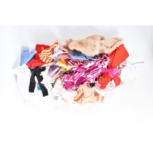 158 - A QUANTITY OF SINDY AND OTHER DOLLS CLOTHING, mainly 1960's/early 1970's, Sindy items include Weeken... 