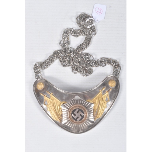 267 - A THIRD REICH GERMANY FLAG BEARERS GORGET, this is a bi coloured metal finish with a prominent Swast... 