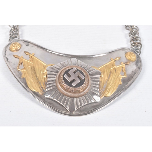 267 - A THIRD REICH GERMANY FLAG BEARERS GORGET, this is a bi coloured metal finish with a prominent Swast... 