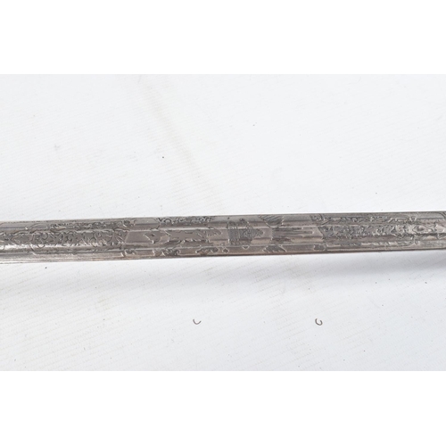 272 - A SCOTTISH OFFICERS BASKET HILT SWORD, the blade has got ornate decoration on it but this is rubbed ... 