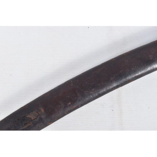 273 - AN EDWARDIAN CURVED SWORD MADE BY E THURKLE OF SOHO LONDON, the blade features the makers name on on... 