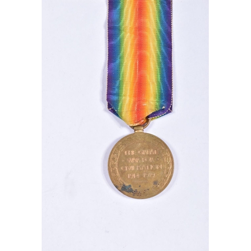 280 - AN INTERESTING FAMILY GROUP OF WWI AND WWII MEDALS AND PHOTOGRAPHS, the medals consist of a 1914 mon... 