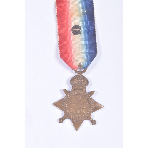 280 - AN INTERESTING FAMILY GROUP OF WWI AND WWII MEDALS AND PHOTOGRAPHS, the medals consist of a 1914 mon... 