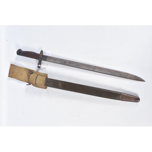 287 - A WWI UNITED STATES 1917 REMINGTON BAYONET, this has a ribbed wooden grip and the blade has clear ma... 