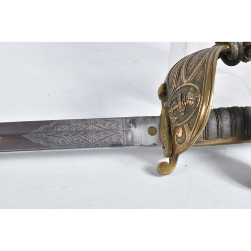 291 - A 19TH OR 20TH CENTURY NAVAL DRESS SWORD, the blade has some ornate decoration on it but it is rubbe... 