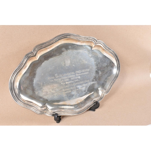 302 - A GERMAN SILVER PRESENTATION PLATTER OF SHAPED OVAL FORM, engraved with the coat of arms of Lower Au... 