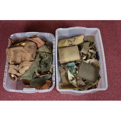 307 - TWO BOXES OF MILITARY RELATED ITEMS, these include a large selection of belts, a 1952 U.S side cap, ... 