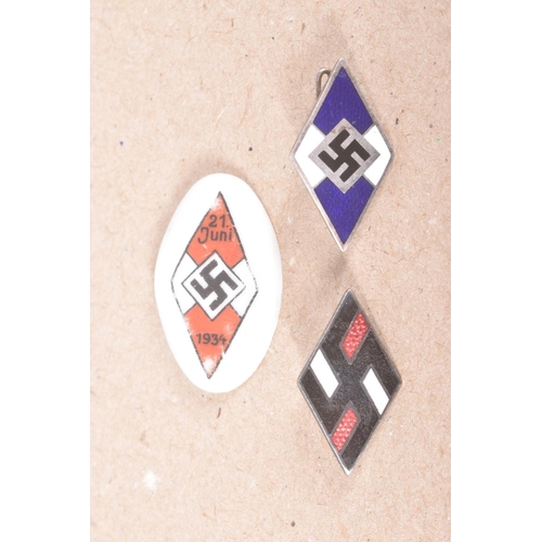 308 - TWO GERMAN THIRD REICH PIN BADGES AND LOZENGE, the first pin is a HJ German Youth Pin with blue and ... 