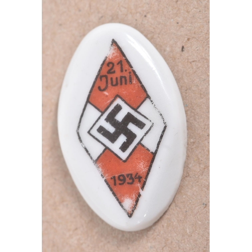 308 - TWO GERMAN THIRD REICH PIN BADGES AND LOZENGE, the first pin is a HJ German Youth Pin with blue and ... 