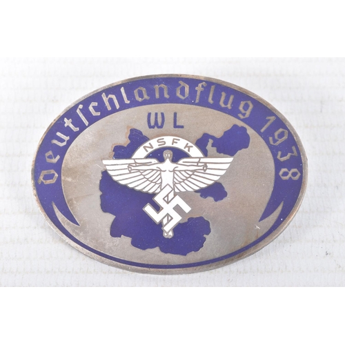 309 - TWO THIRD REICH GERMANY PIN BADGES, the first is a pin badge for the NSFK of National Socialist Flie... 