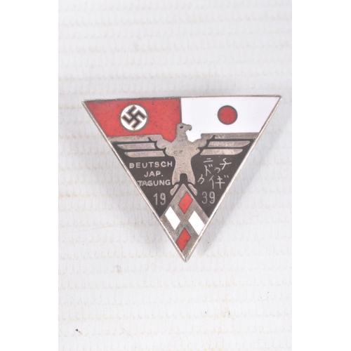 312 - THREE WWI/WW2 ERA PIN BADGES, these badges consist of a Veterans Bund WWI cross with maker mark Gese... 