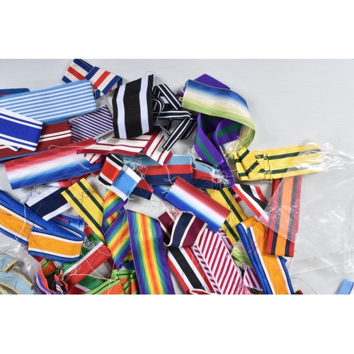 326 - A LARGE QUANTITY OF ASSORTED MEDAL RIBBONS, the ribbons cover medals from Boer war up to modern conf... 