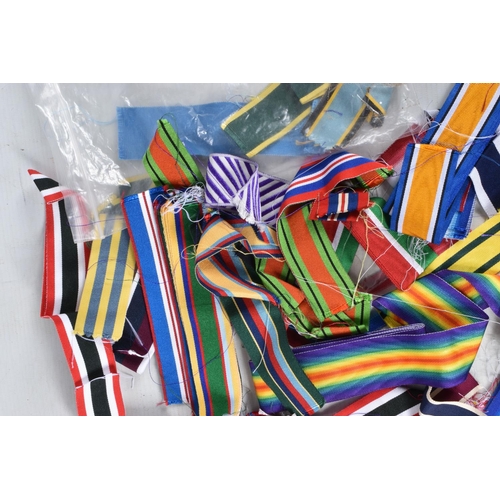 326 - A LARGE QUANTITY OF ASSORTED MEDAL RIBBONS, the ribbons cover medals from Boer war up to modern conf... 