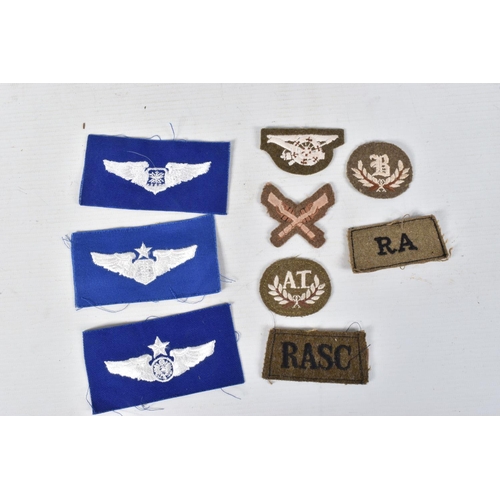 328 - A LARGE SELECTION OF MEDAL RIBBONS, M.I.D OAK LEAVES AND CLOTH INSIGNIA, the medal ribbons are brand... 