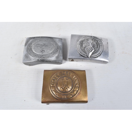 332 - THREE GERMAN BELT BUCKLES, the first is a brass Kriegsmarin buckle, the second is a German Youth bel... 