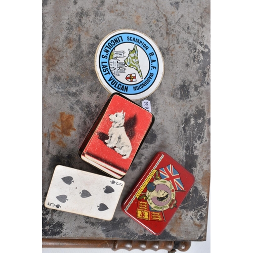 340 - A TIN CONTAINING VARIOUS RAF RELATED ITEMS AND A TRUNCHEON, the RAF items include a white metal swee... 