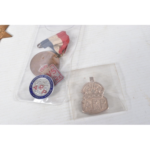 343 - A COLLECTION OF WWII MEDALS AND BADGES ETC, this lot includes an empty WWII Royal Navy medal box, a ... 