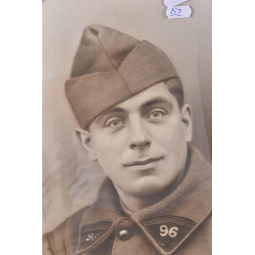 344 - A FRAMED PHOTO OF A FRENCH SOLDIER AND TWO MEDALS, the picture is in a carved wooden frame and featu... 