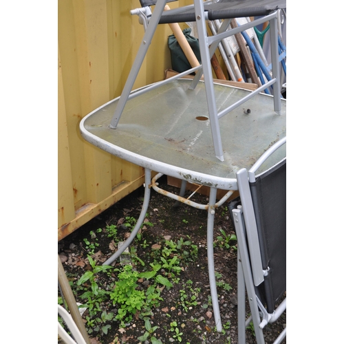 1003 - A GLASS TOPPED STEEL GARDEN TABLE and four matching folding chairs table width and depth 80cm height... 