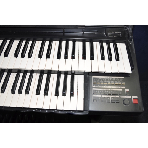1069 - A YAMAHA ELECTONE HE 6 ORGAN with double keyboard and pedals (PAT pass and working) together with a ... 