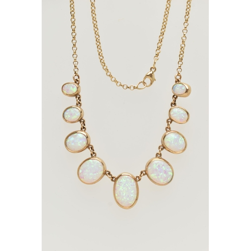 1 - A 9CT GOLD, SYNTHETIC OPAL NECKLACE, designed as a graduated series of oval synthetic opal cabochons... 