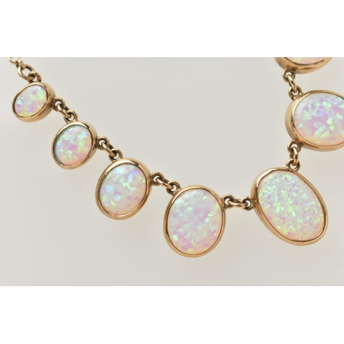 1 - A 9CT GOLD, SYNTHETIC OPAL NECKLACE, designed as a graduated series of oval synthetic opal cabochons... 