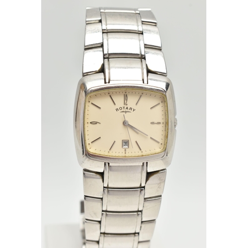 104 - TWO GENTLEMAN'S WRISTWATCHES, to include a Seiko quartz gold coloured stainless steel watch with day... 