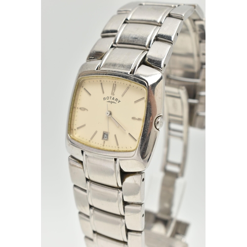 104 - TWO GENTLEMAN'S WRISTWATCHES, to include a Seiko quartz gold coloured stainless steel watch with day... 