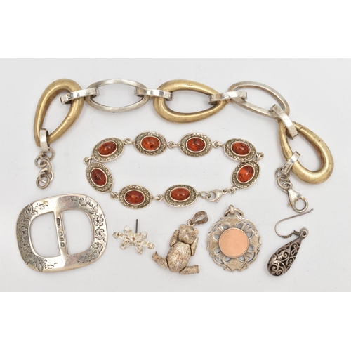 106 - AN ASSORTMENT OF SILVER AND WHITE METAL JEWELLERY, to include a silver buckle, a silver teddy bear p... 