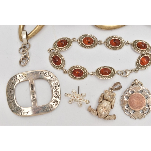 106 - AN ASSORTMENT OF SILVER AND WHITE METAL JEWELLERY, to include a silver buckle, a silver teddy bear p... 