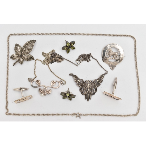 107 - AN ASSORTMENT OF SILVER AND WHITE METAL JEWELLERY, to include a silver military badge, hallmarked Ed... 