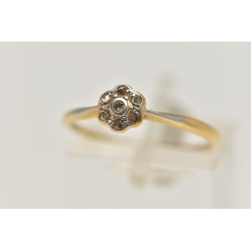 11 - A YELLOW AND WHITE METAL DIAMOND CLUSTER RING, small flower cluster, set with rose cut diamonds, in ... 